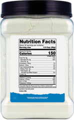 Nutricost Goat Milk Powder mixing-glass showing smooth blend with cold water.