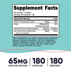 Nutricost Iron for Women 65mg capsules closeup, smooth vegetarian capsules.