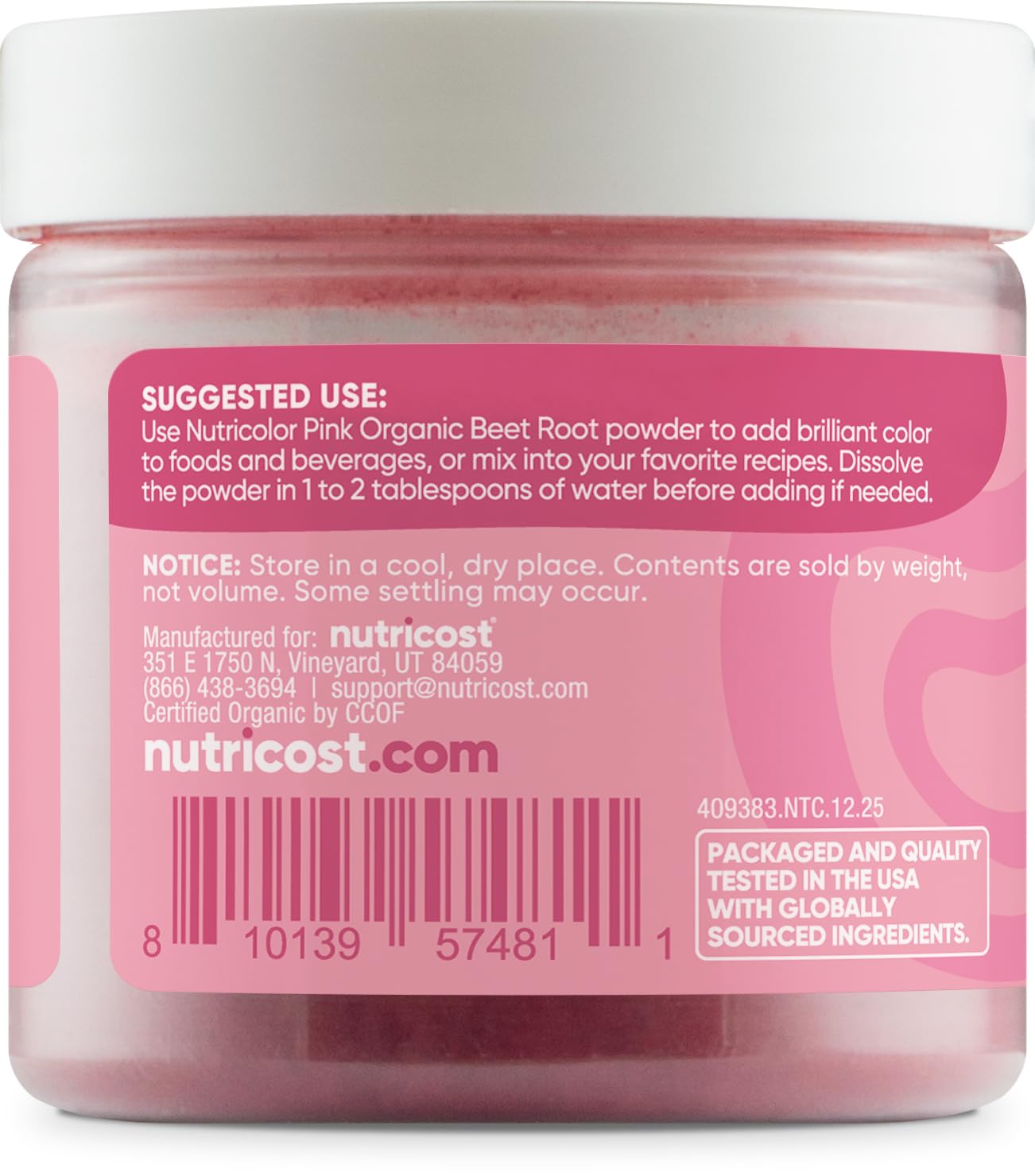 Nutricolor pink beet powder scoop ready for easy recipe measurements.