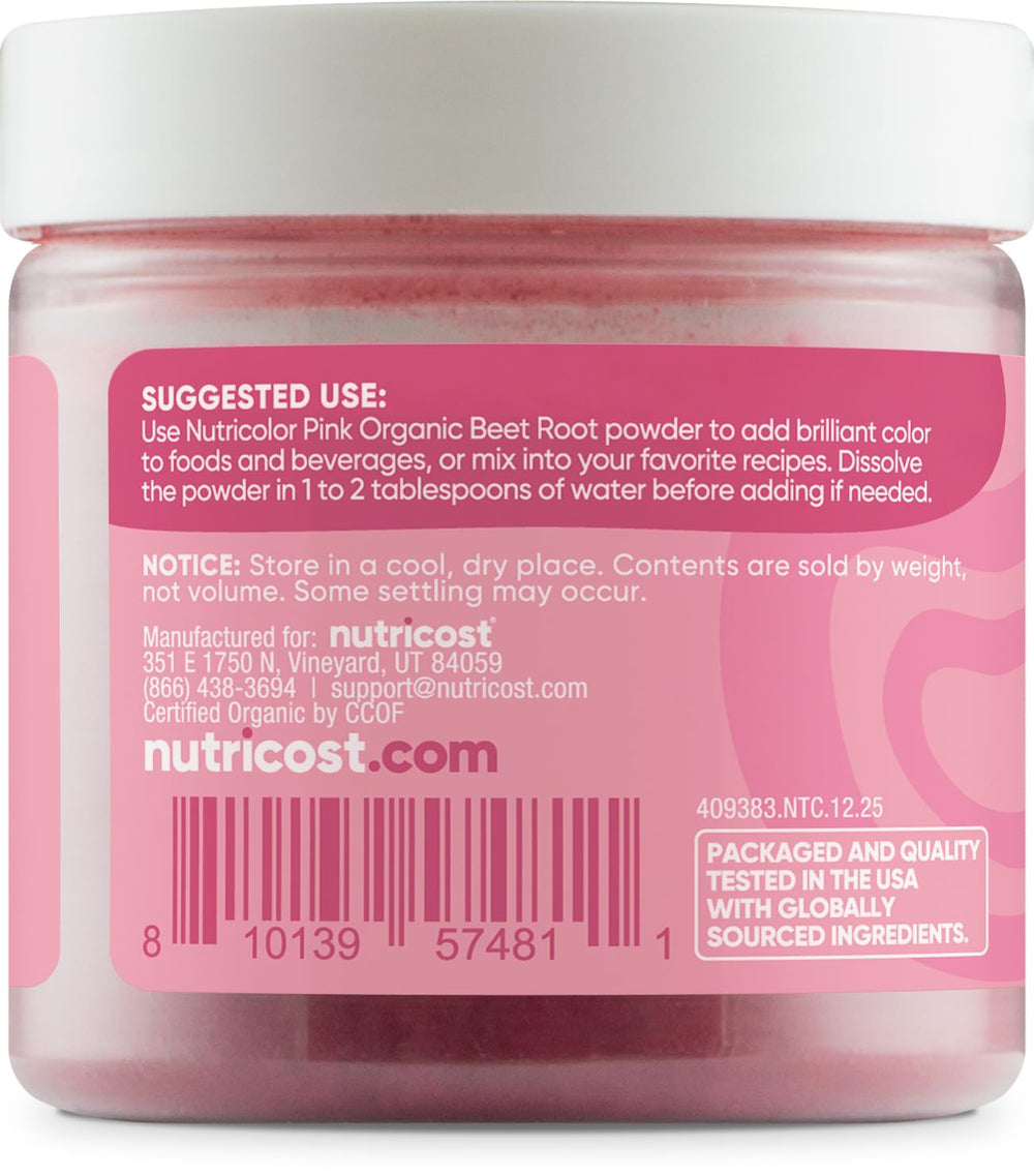 Nutricolor pink beet powder scoop ready for easy recipe measurements.
