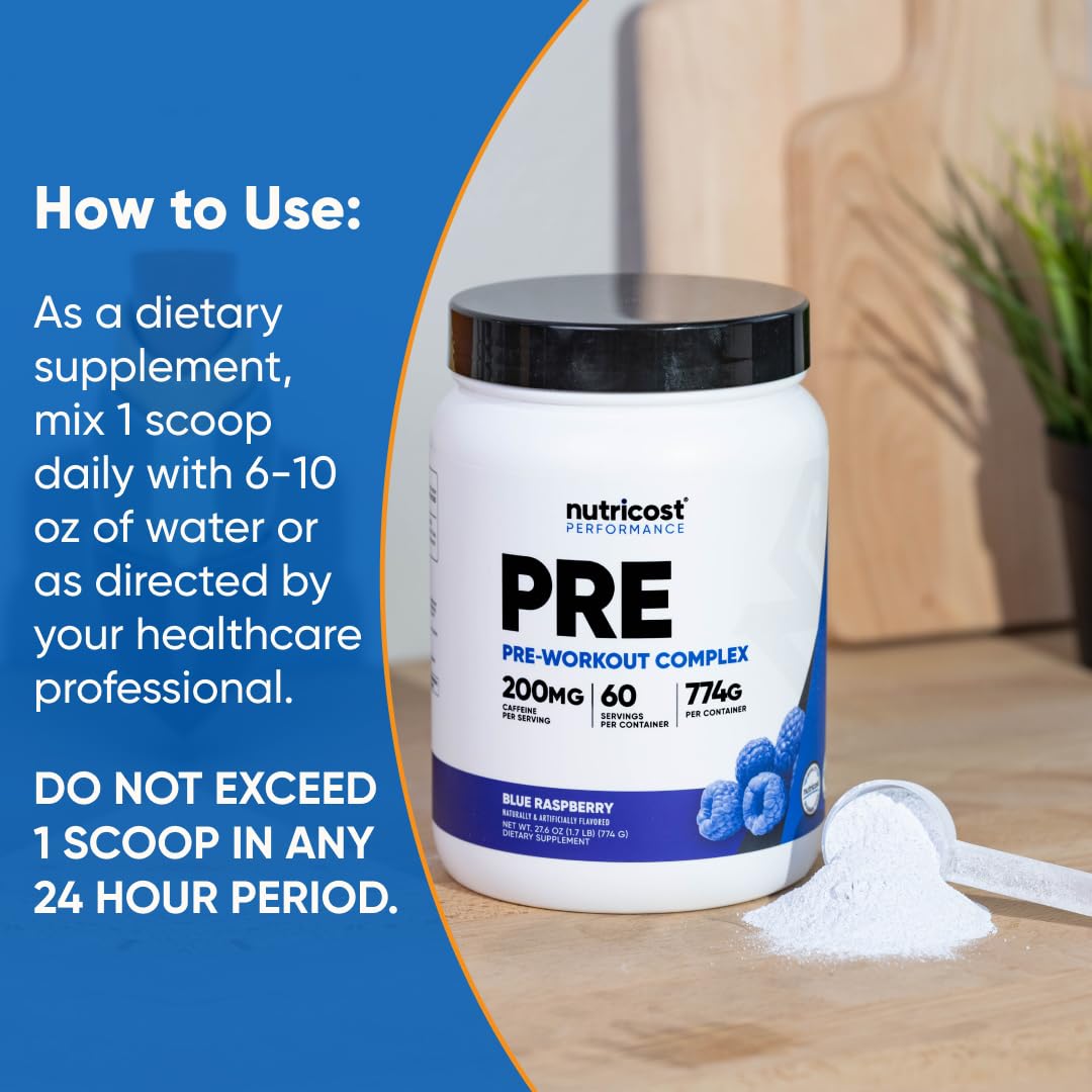 Nutricost fruit punch mixer showing powder blending for steady energy during sessions.