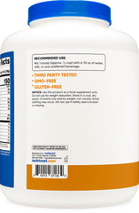 Prepared Nutricost shake in glass shows creamy Chocolate Peanut Butter flavor