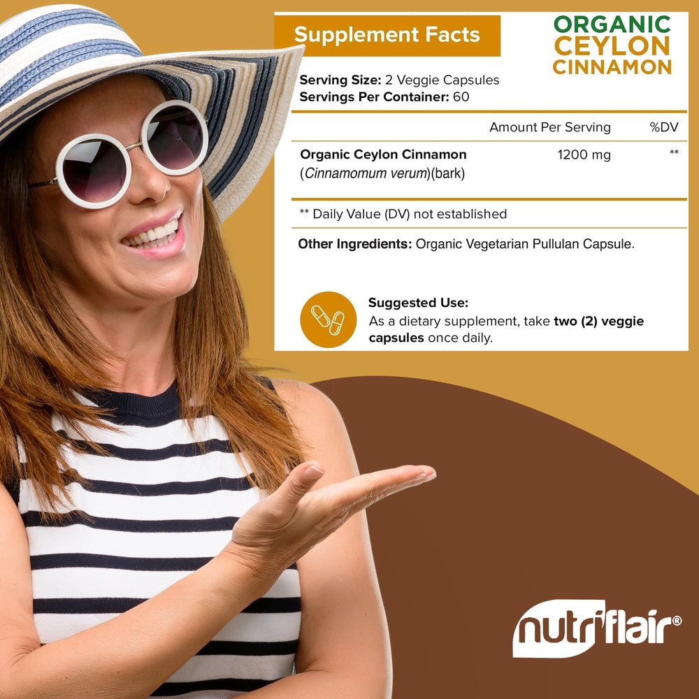 NutriFlair cinnamon capsules bottle beside GMP facility background implies quality production.