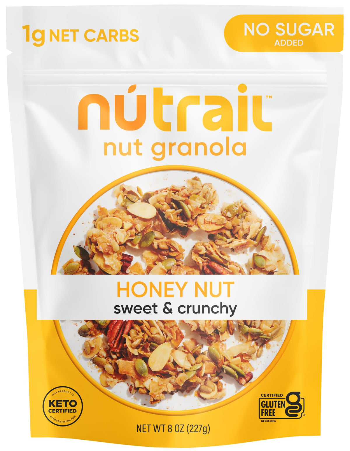 NuTrail Honey Nut granola bowl with milk, gluten-free and keto-friendly.