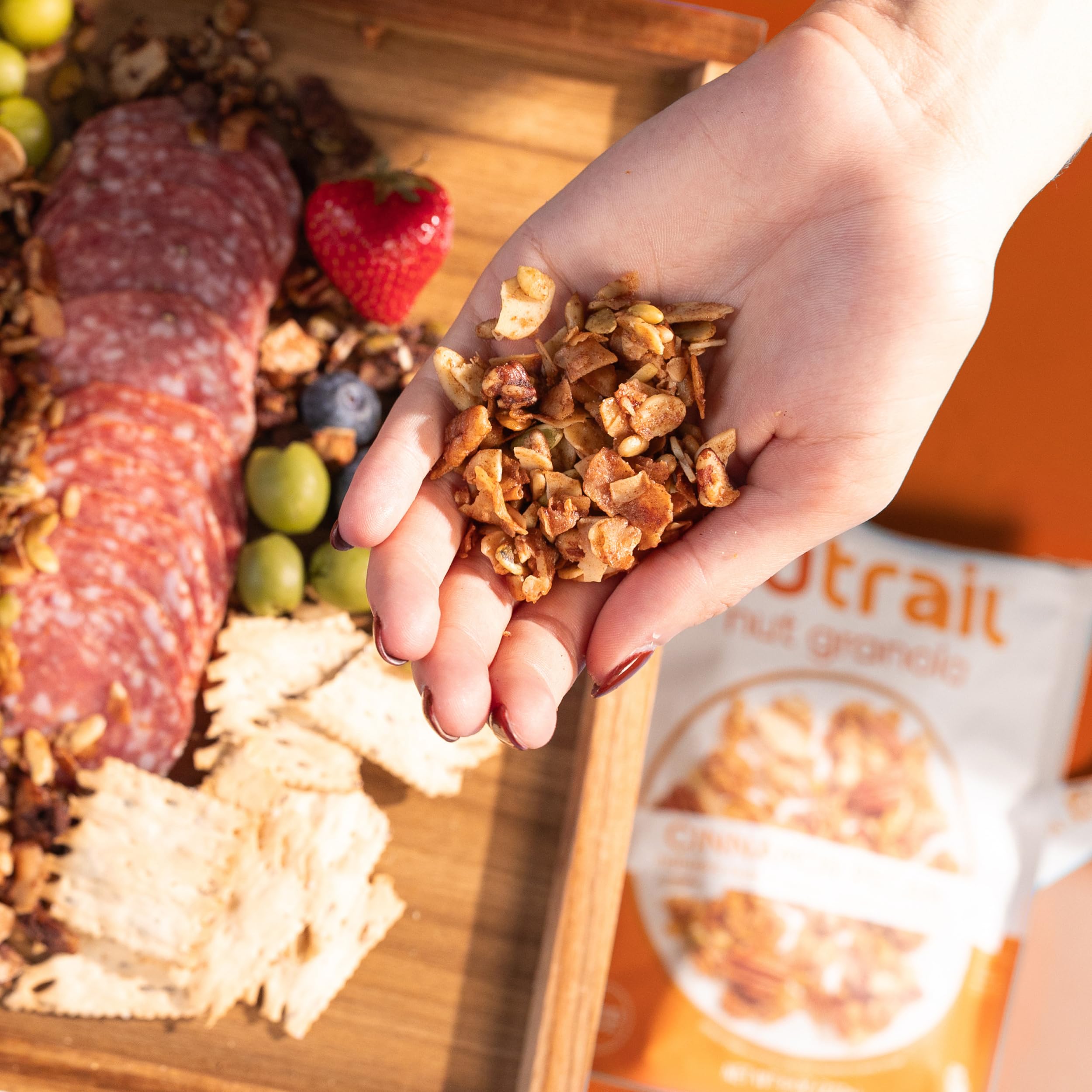 Packaging of NuTrail Cinnamon Pecan granola showing three 8-ounce pouches