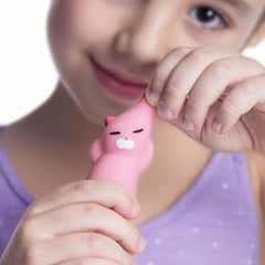 Nutty Toys squishy cat set held in hand demonstrating compact size