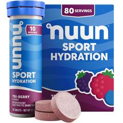 Nuun Tri Berry tablet dissolving in water for easy hydration.