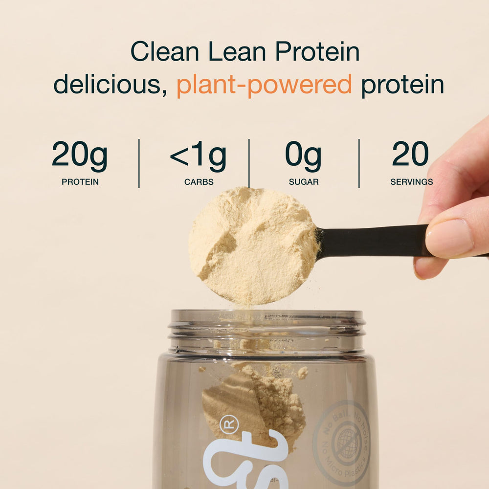 Nuzest pea protein powder being poured into a glass
