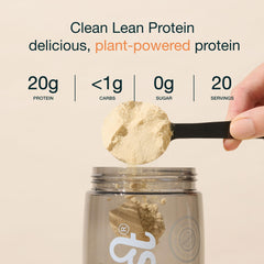 Nuzest pea protein powder being poured into a glass