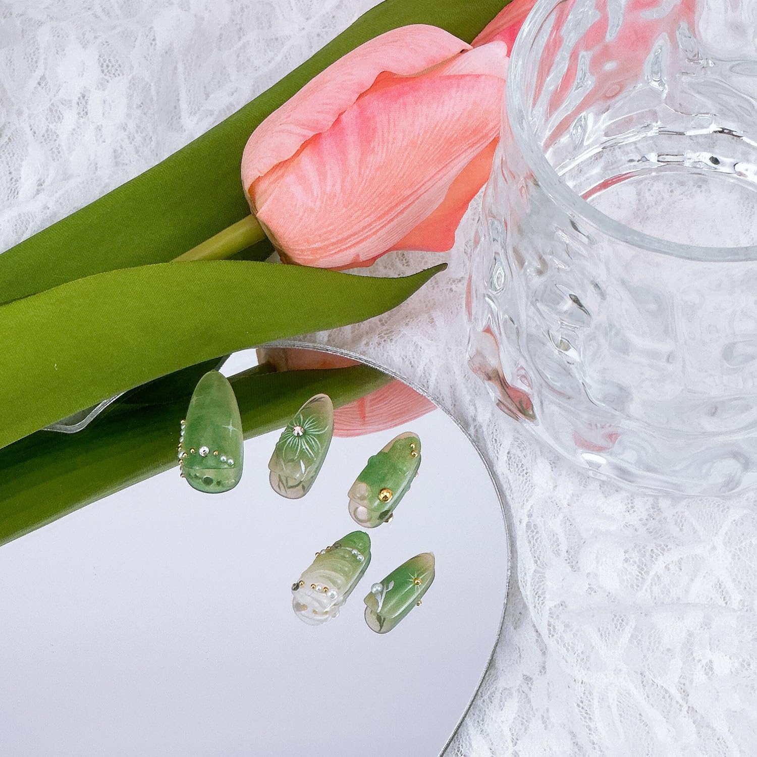 NZRAESTRS gold bead details add luxe vibes to nails