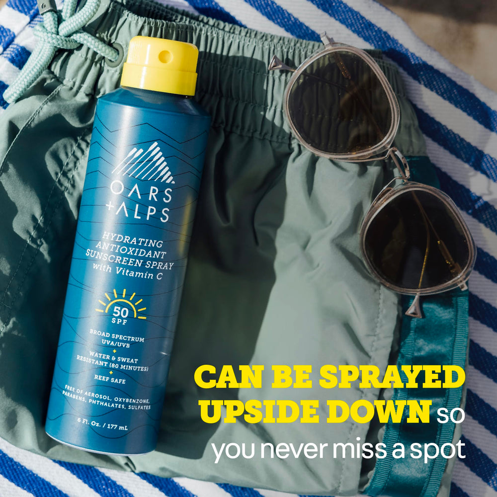 Oars + Alps water- and sweat-resistant SPF 50 spray for outdoor protection.