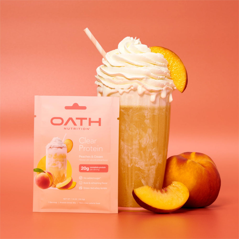 Glass of peaches-tinted clear shake after a workout