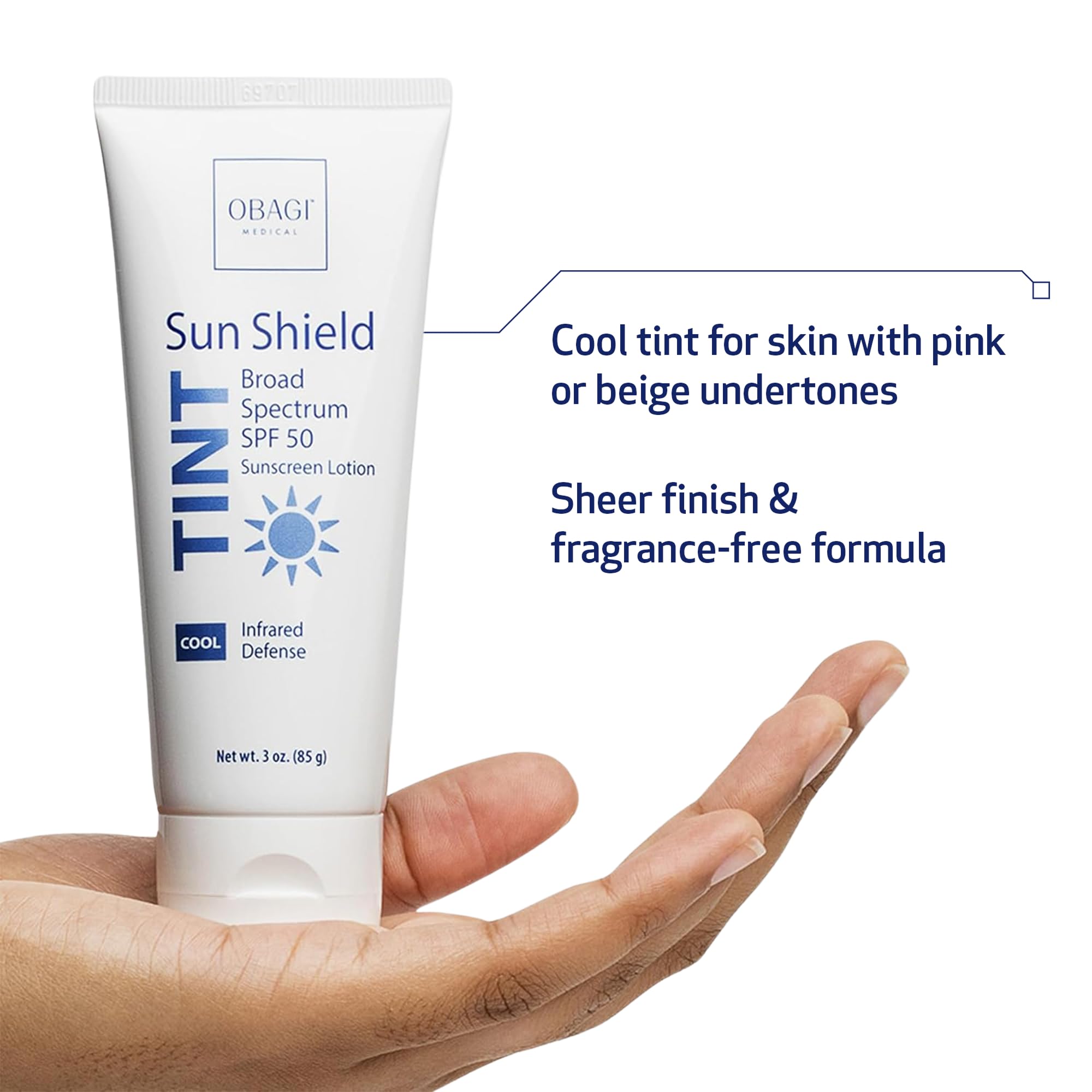 Hands applying Obagi Sun Shield tinted sunscreen for a sheer finish