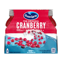 Ocean Spray Cranberry Cocktail Juice Drink bottle pouring into a glass for a refreshing mixer