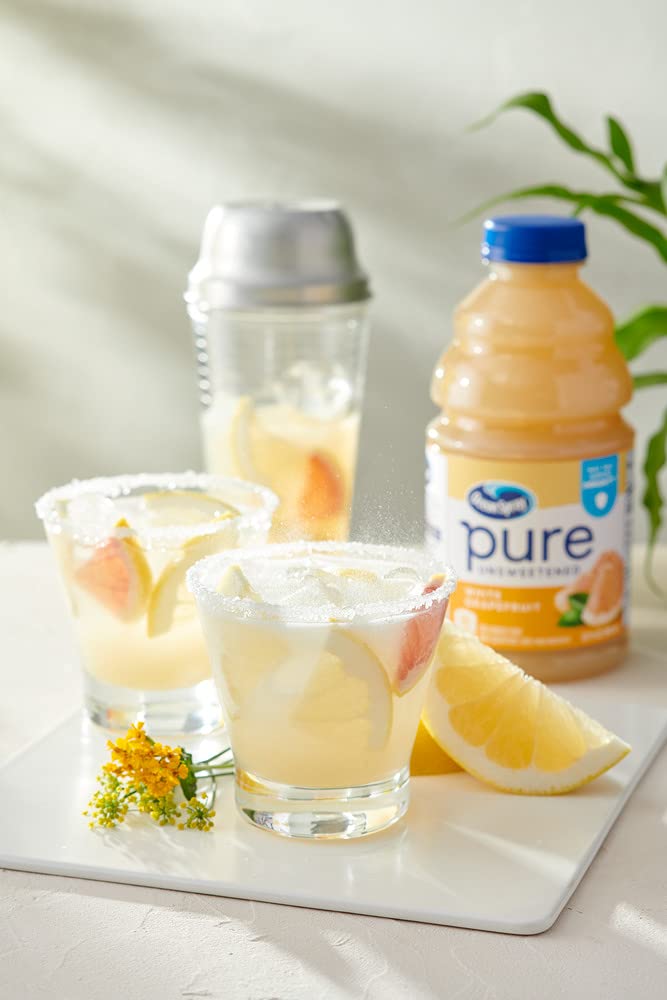 Juice poured into a glass for refreshing drinks with grapefruit brightness.