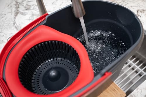 O-Cedar mop-head reaches under furniture for thorough coverage.