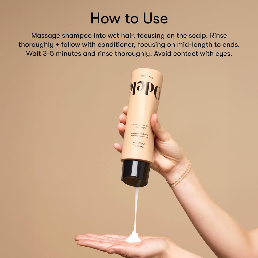 Odele Thickening Conditioner label close-up notes caffeine and botanicals for scalp refreshment.