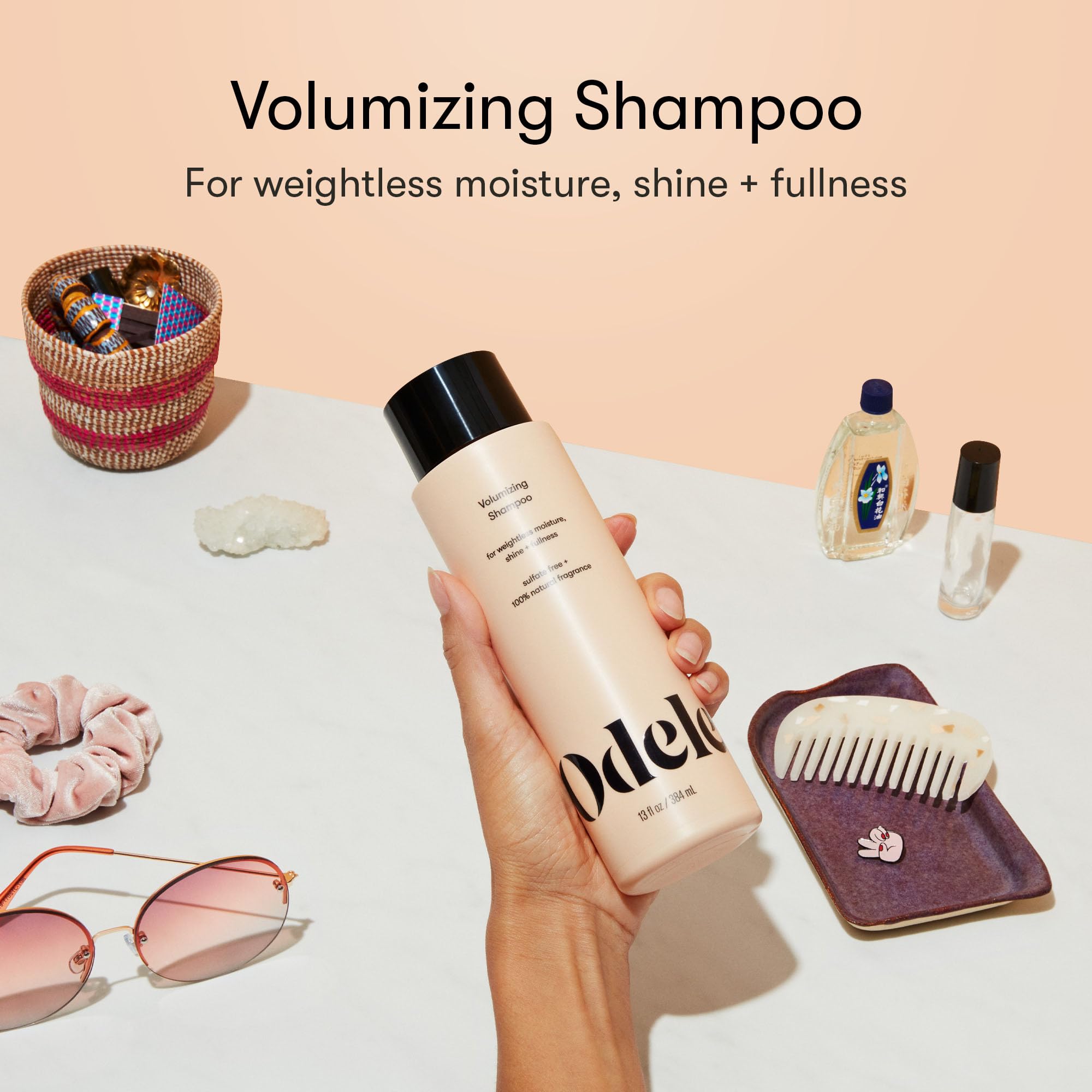 Odele Volumizing Shampoo label closeup highlights clean, sulfate-free formula for sensitive scalps