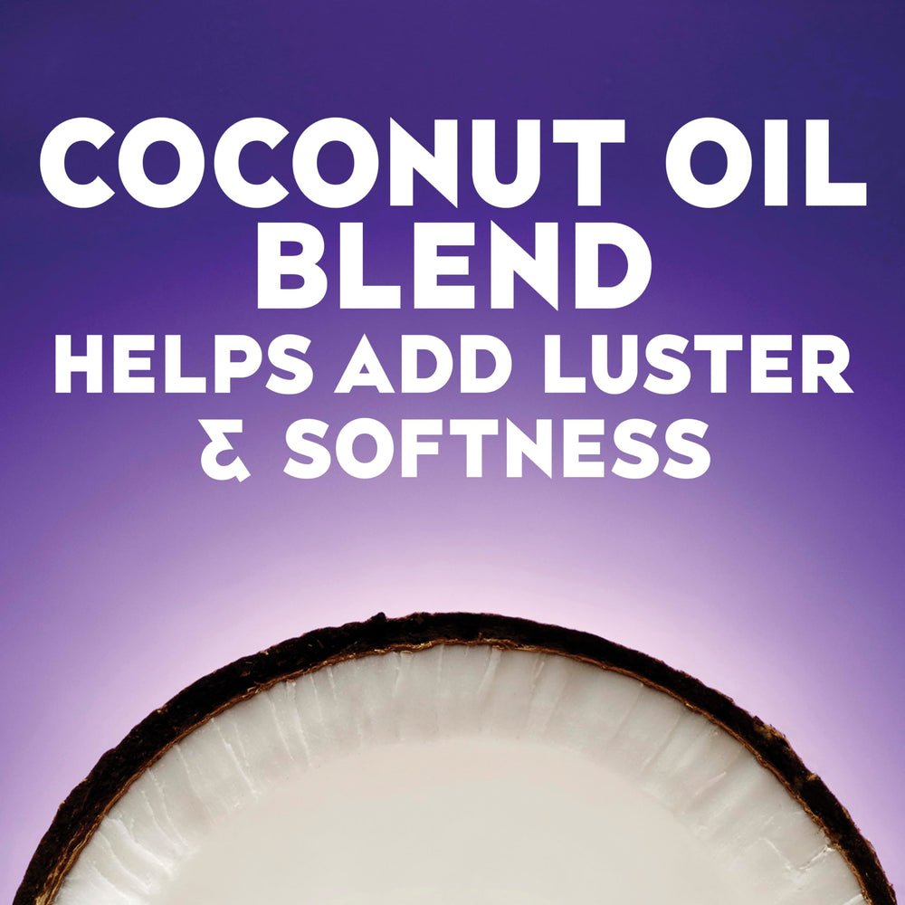 Fragrance detail of OGX Coconut Miracle Oil Shampoo with creamy coconut scent