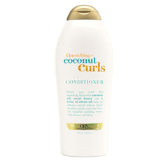 OGX Quenching + Coconut Curls bottle pour delivering detangling hydration