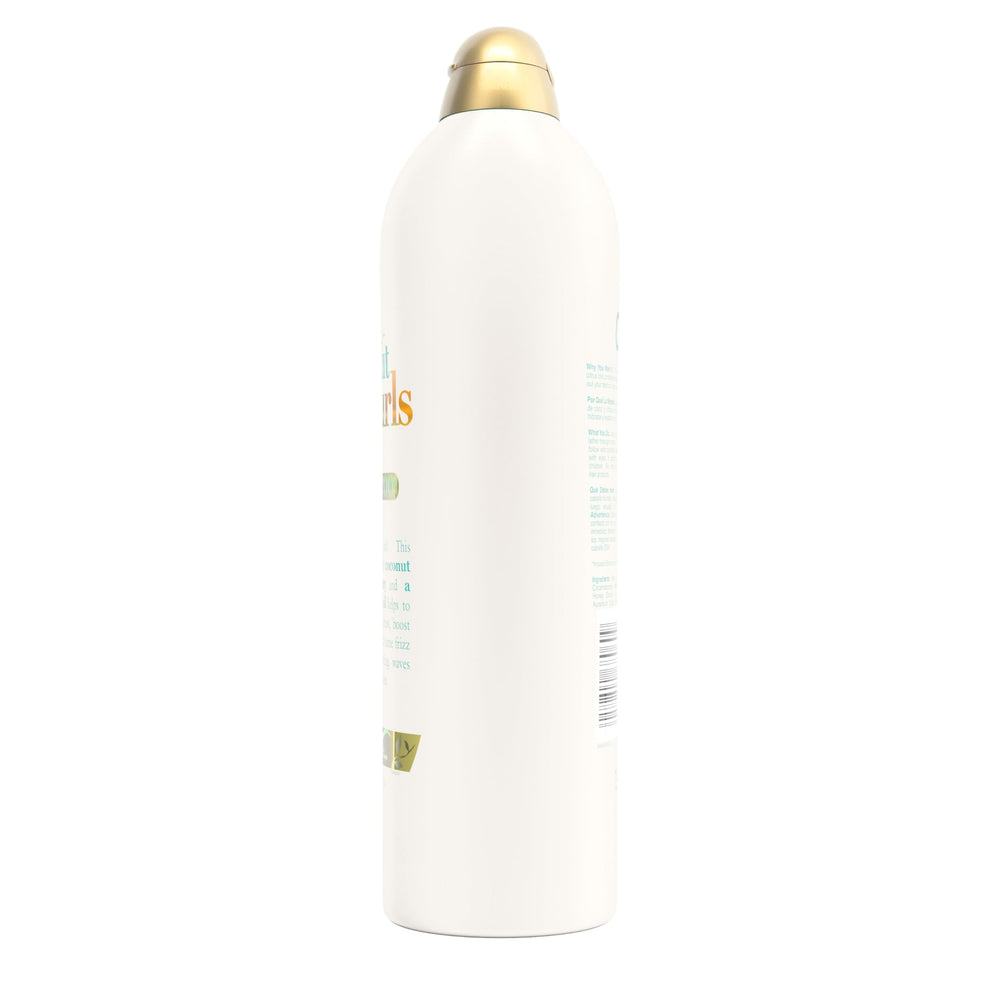 OGX Quenching + Coconut Curls Shampoo packaging on shelf for easy grab