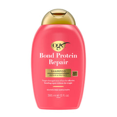 OGX Repair & Protect Bond Shampoo bottle highlights bond repair formula for damaged hair.
