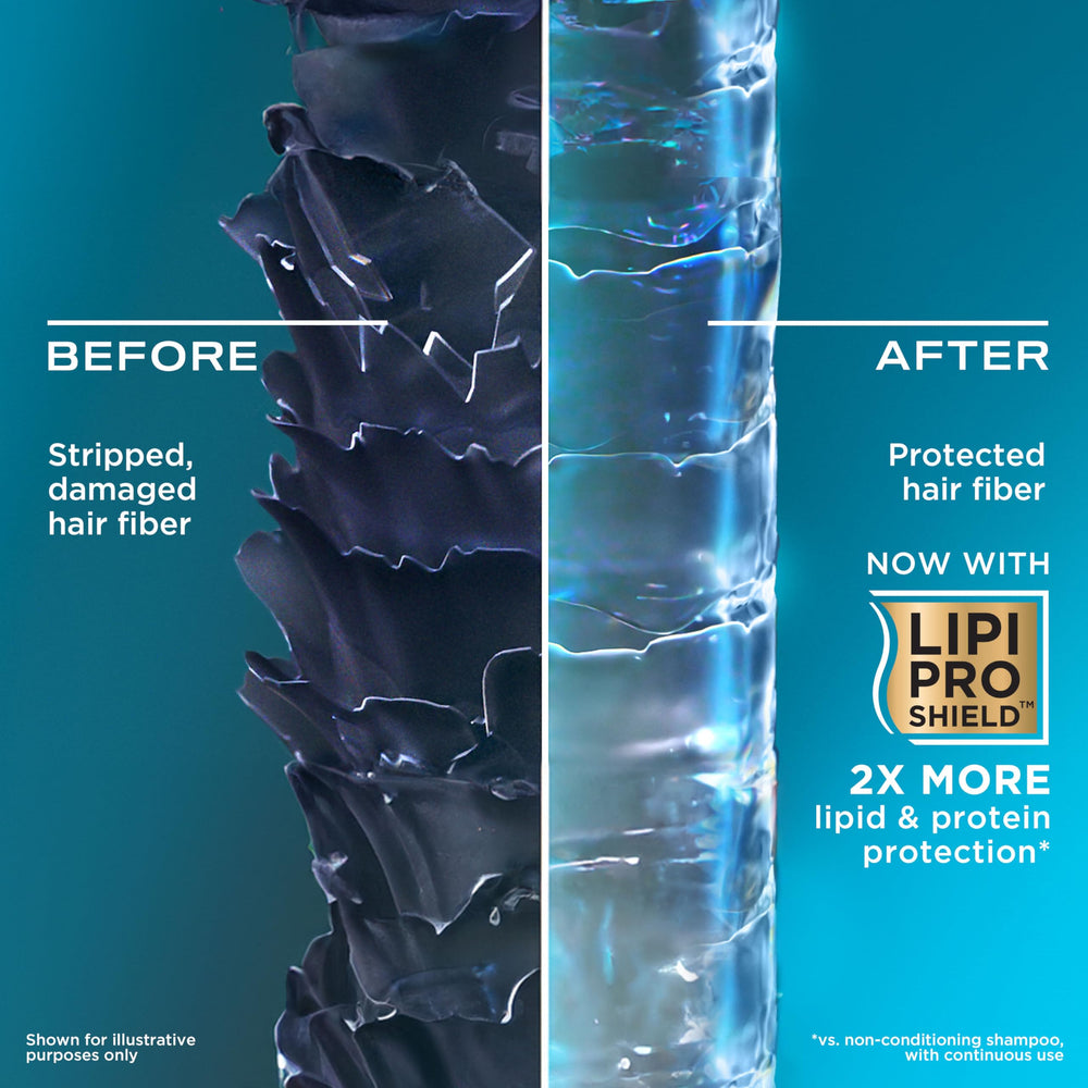 Applying OGX Rosemary Mint conditioner to hair after washing