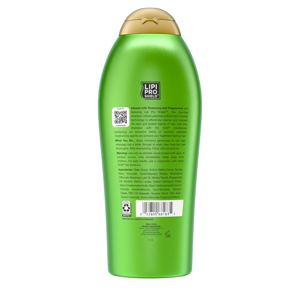 OGX Rosemary Mint shampoo displayed in a bright bathroom scene