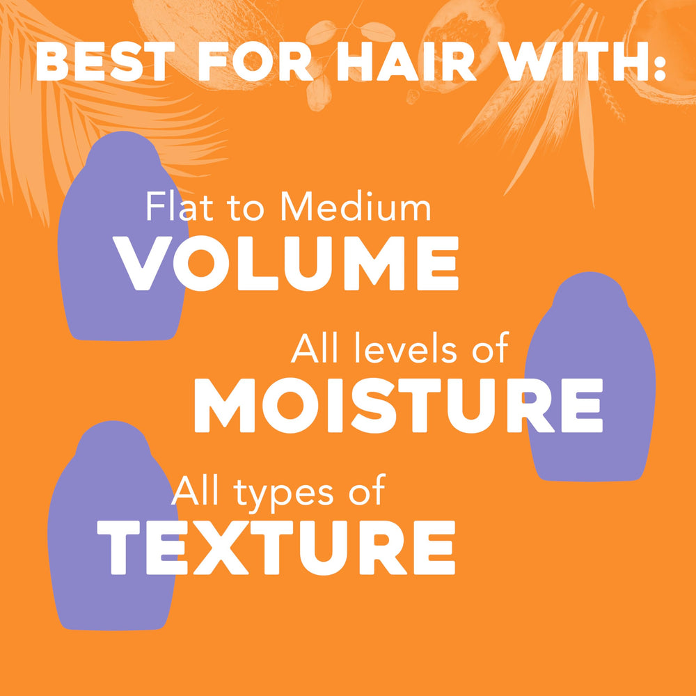 Creamy foam from OGX shampoo demonstrates lightweight cleansing and volume.