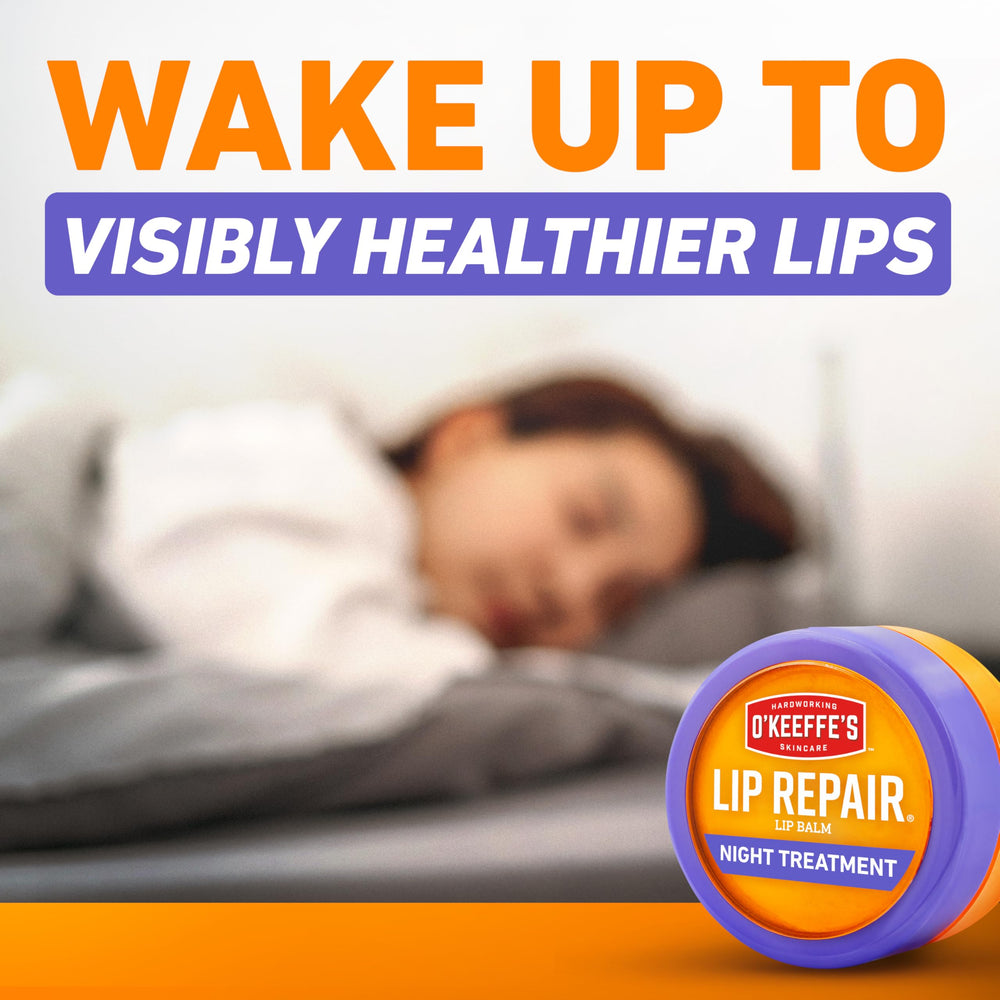 Top view of O'Keeffe's Lip Repair night treatment jar showing creamy balm texture