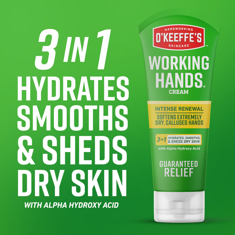Hands applying O'Keeffe's cream to rough skin.