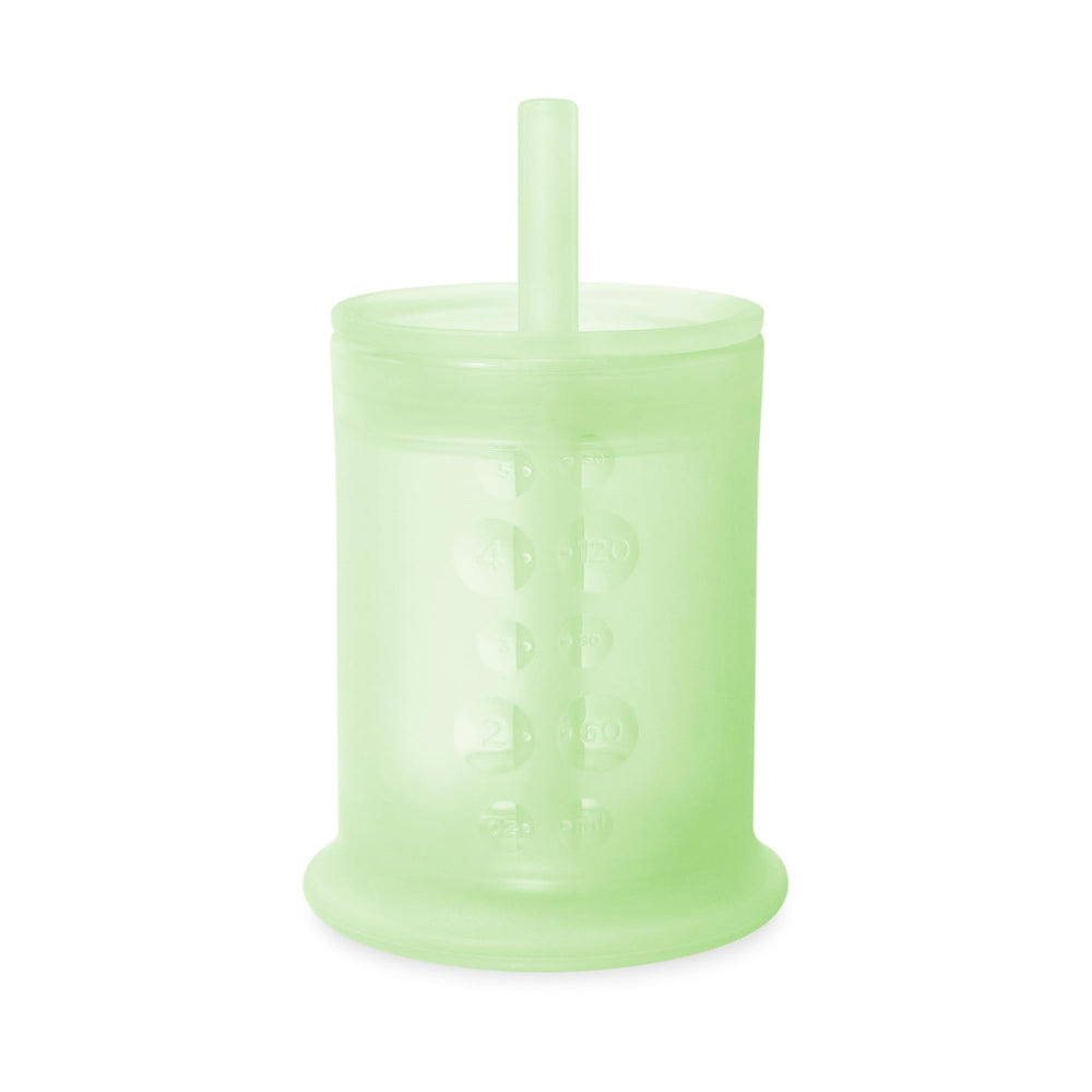 Olababy silicone training cup with straw lid, easy grip for tiny hands and steady hydration.