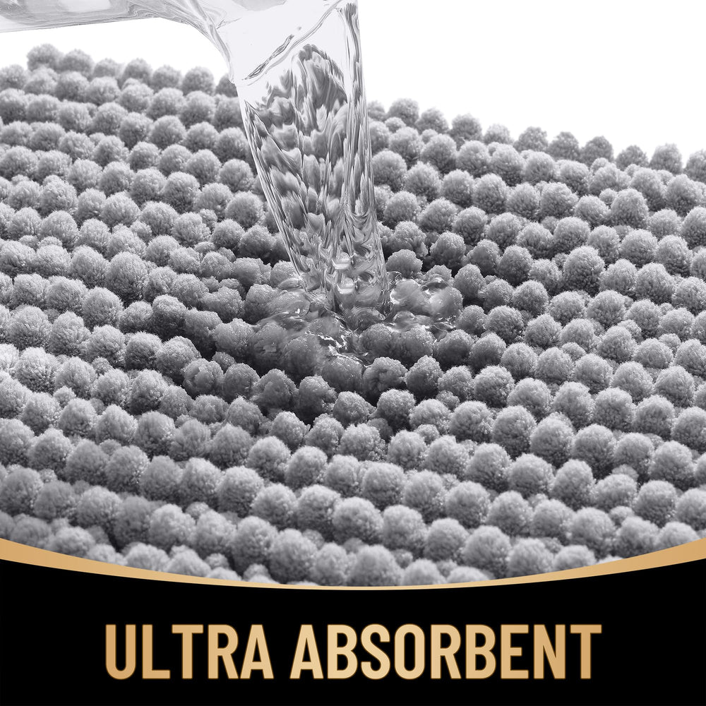 OLANLY rubber-backed mat prevents slipping on bathroom surfaces.