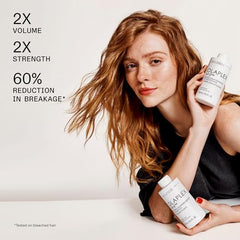 Olaplex N°0.5 treatment bottle preps hair for strength and manageability.