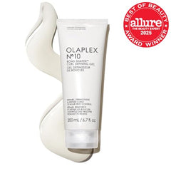 Olaplex No.10 curl-define closeup showing defined, glossy curls with no crunch.
