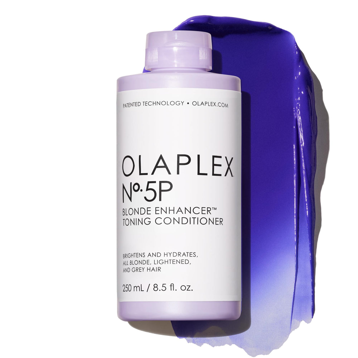 Olaplex N°5P purple toner conditioner bottle pour reduces brassiness while hydrating hair.