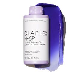 Olaplex N°5P purple toner conditioner bottle pour reduces brassiness while hydrating hair.