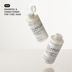 Olaplex No. 4 FINE on a shelf with No. 5 conditioner nearby