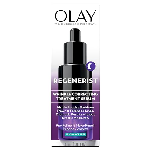 Night-time skincare setup with Olay Regenerist Resurfacing Retinol Serum beside a lamp.