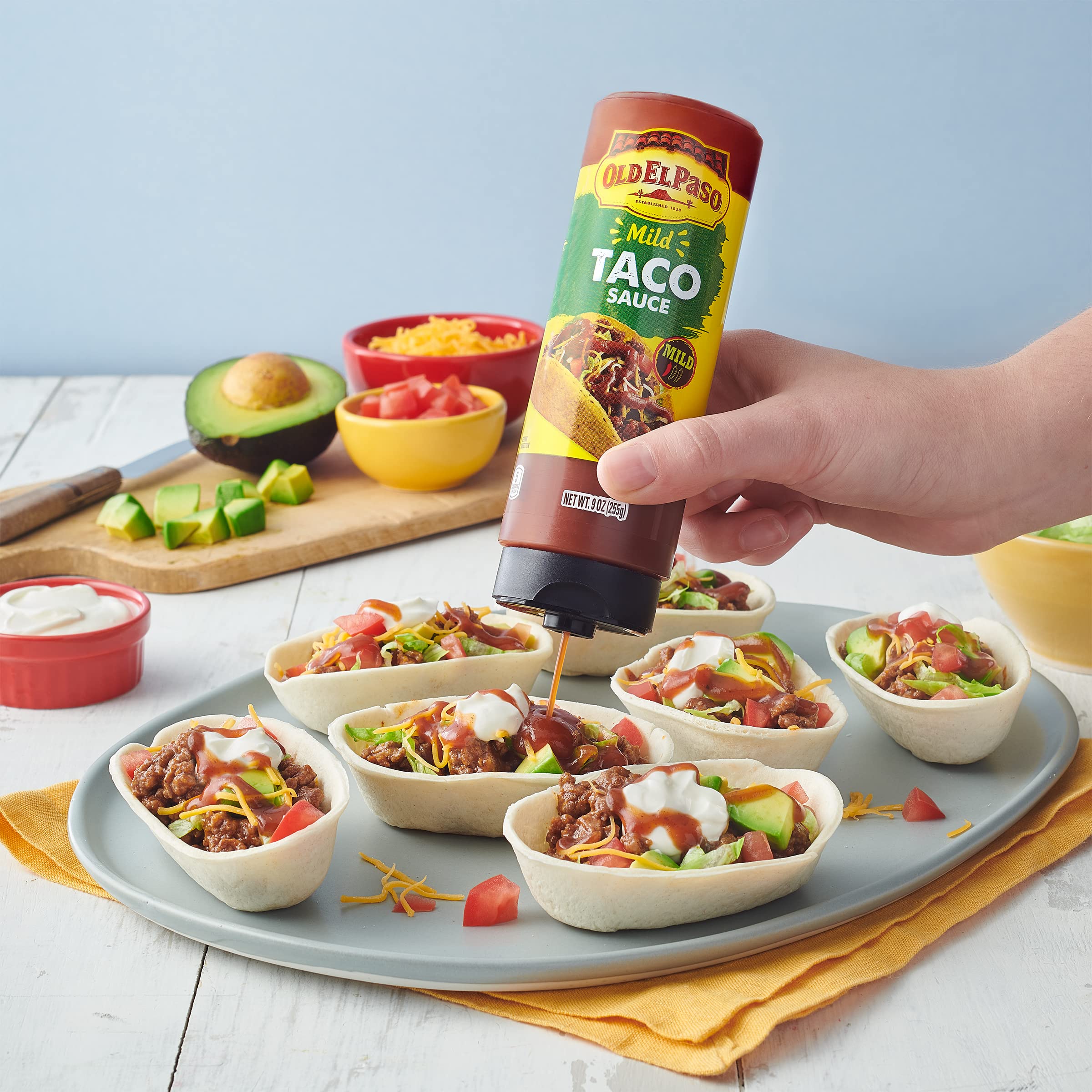 Old El Paso Mild Taco Sauce on tacos for quick weeknight flavor