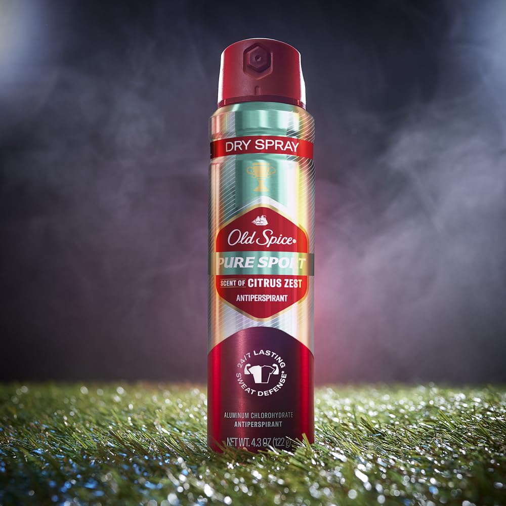 Old Spice invisible dry spray applied underarm with a clear finish.
