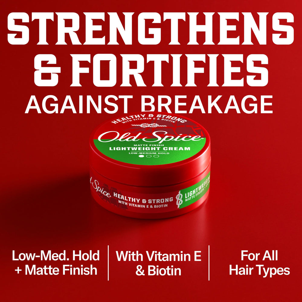 Damp hair being prepared with Old Spice Lightweight Cream.