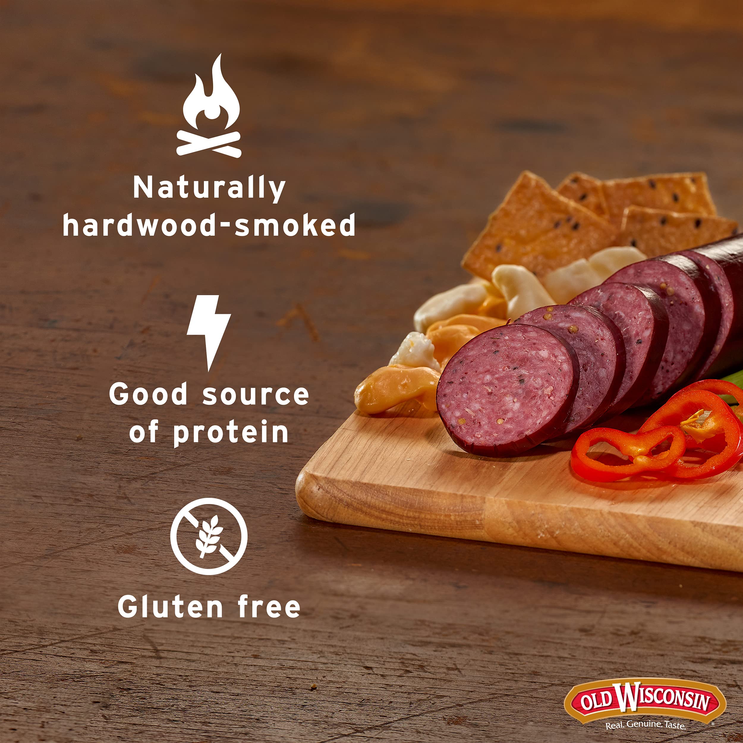 Old Wisconsin beef sausage on a charcuterie board with cheese and fruit.
