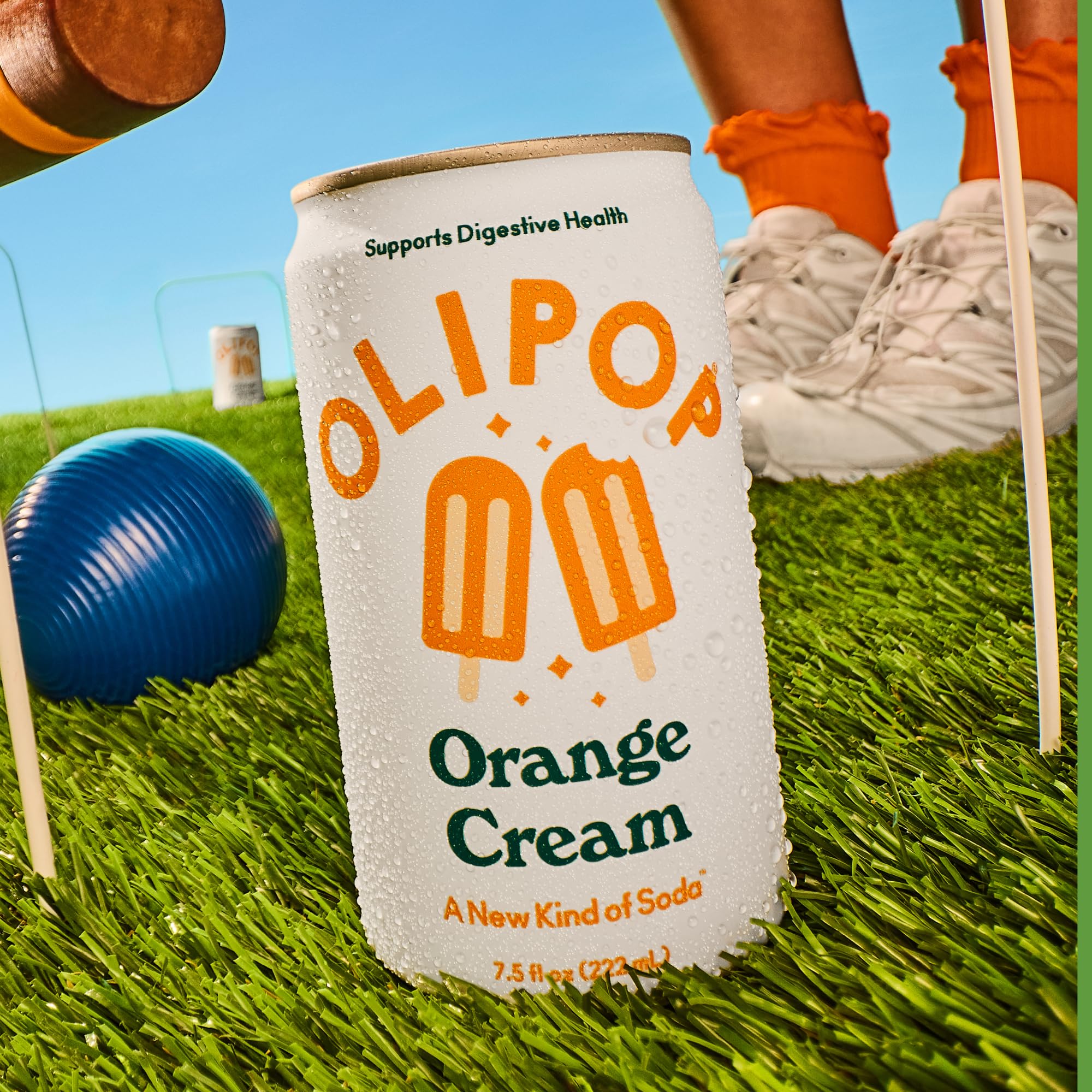 Chilled OLIPOP Minis Orange Cream glass with condensation for a refreshing, fiber-forward treat.