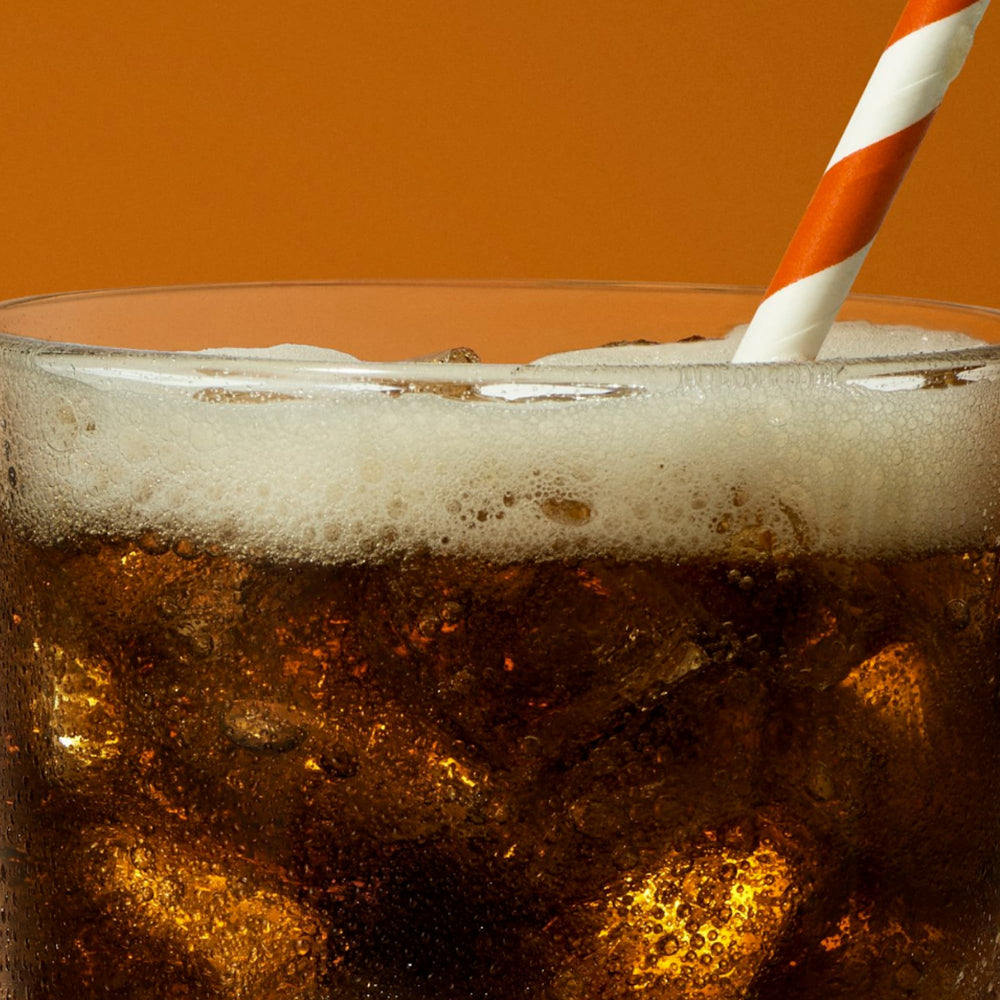 OLIPOP Root Beer served on a table, suggesting casual family gatherings.