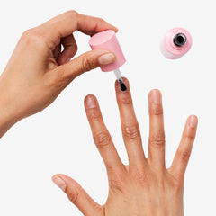 Olive and June Nail Strengthener brush on nails application demonstrates smooth coverage