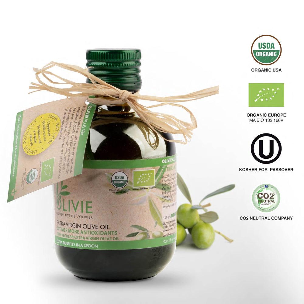 OLIVIE Plus amber glass bottle close-up highlighting durability and freshness.