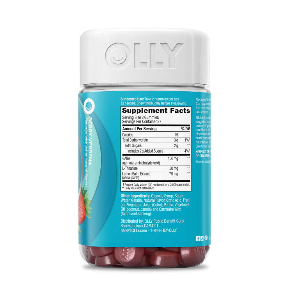 OLLY Goodbye Stress Gummies on table beside glass of water for routine use