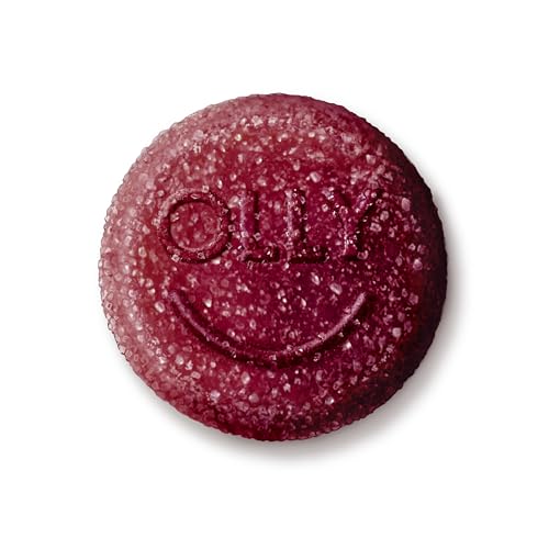 OLLY Relaxing Magnesium Gummies bottle open on countertop