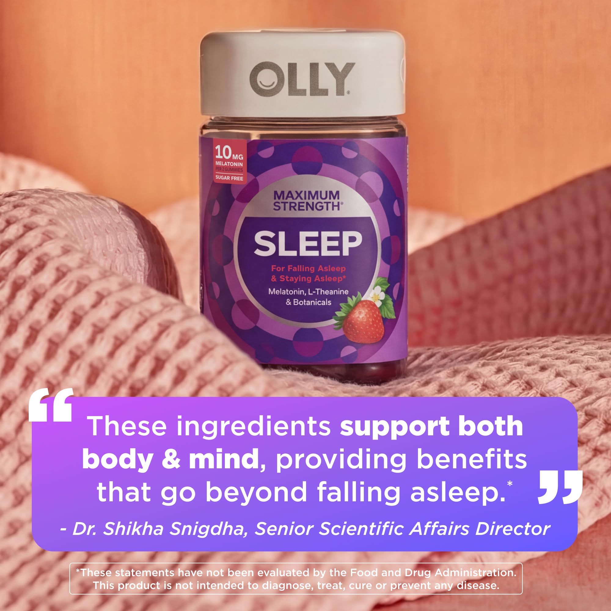 OLLY Max Strength Sleep Gummy closeup strawberry burst highlighting flavor and texture.